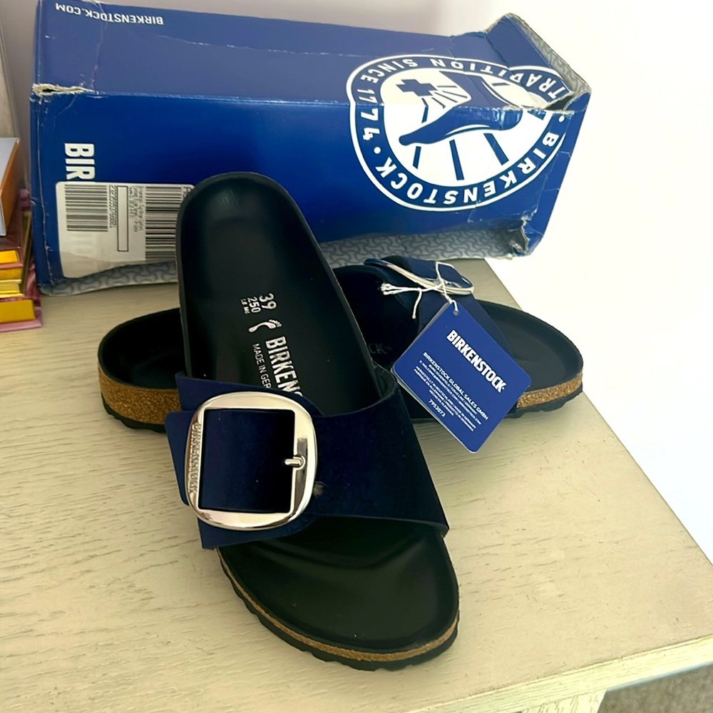 Birkenstock slid on navy blue size 39. Never used.